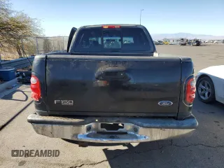 2002 Ford F-150 XLT with VIN 1FTRW07682KB94008, listed as a Copart auction lot 88724185 with 231,464 mi miles and Salvage Title. Bid and sale history available at carsss.com. Image 6.