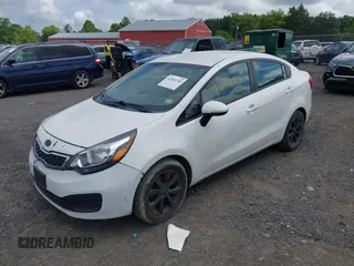 2013 Kia Rio EX with VIN KNADN4A35D6118466, listed as a IAAI auction lot 42654356 with 142,642 mi miles and . Bid and sale history available at DreamBid. Image 2.