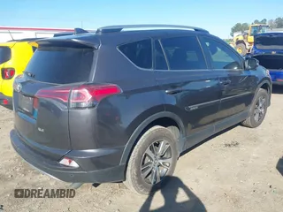 2018 Toyota RAV4 XLE with VIN JTMWFREV9JJ200629, listed as a IAAI auction lot 41821491 with 184,706 mi miles. Bid and sale history available at carsss.com. Image 4.