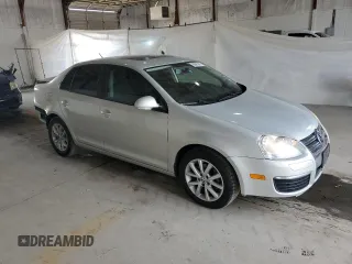 2010 Volkswagen Jetta SEL z VIN 3VWRX7AJ4AM100858, wystawiony jako Copart lot #60695995 z przebiegiem 158 477 mil mil oraz Szkoda całkowita • Salvage title. Historia ofert i sprzedaży dostępna na DreamBid. Obrazek 4.