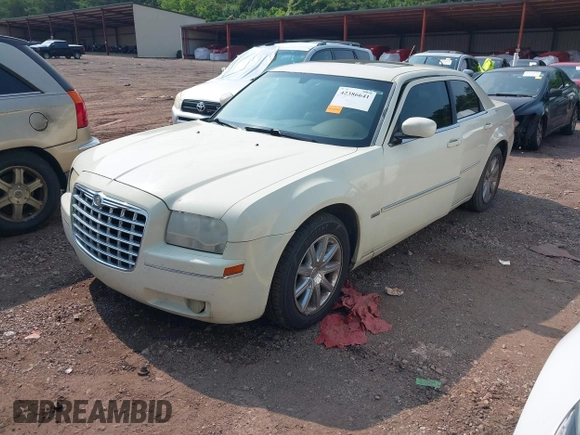 2008 Chrysler 300 Touring with VIN 2C3LA53G28H281603, listed as a IAAI auction lot 42386641 with 230,443 mi miles and . Bid and sale history available at DreamBid. Image 2.