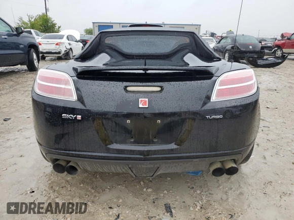 2009 Saturn Sky Red Line z VIN 1G8MG35X39Y106052, wystawiony jako Copart lot #69893854 z przebiegiem 124 937 mil mil oraz Szkody całkowita. Historia ofert i sprzedaży dostępna na DreamBid. Obrazek 6.