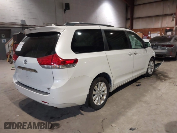 2011 Toyota Sienna XLE with VIN 5TDDK3DC8BS013015, listed as a IAAI auction lot 41445174 with 127,109 mi miles. Bid and sale history available at carsss.com. Image 4.