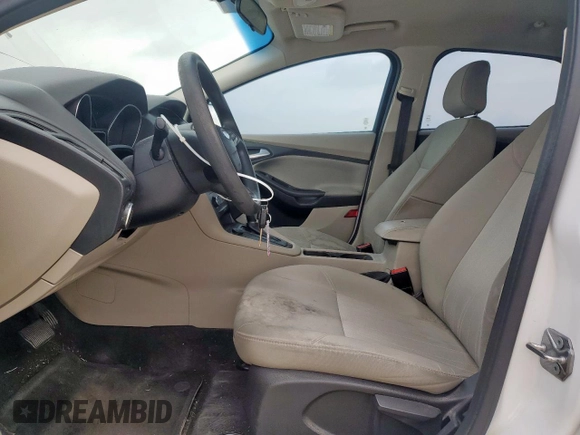 2018 Ford Focus SE with VIN 1FADP3F23JL246375, listed as a Copart auction lot 56539005 with 83,130 mi miles and Salvage title. Bid and sale history available at DreamBid. Image 7.
