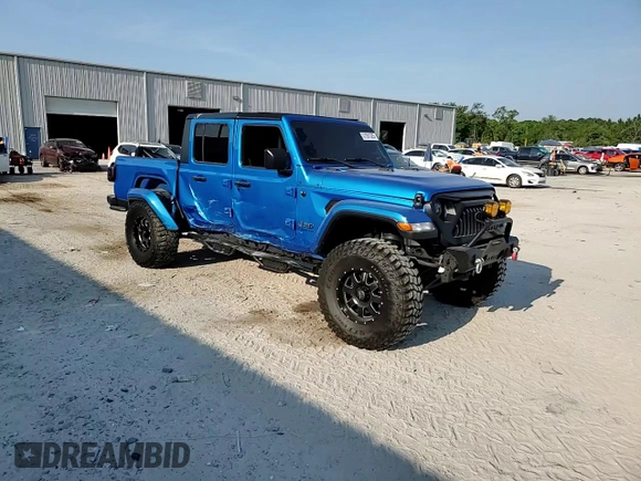 2020 Jeep Gladiator Overland with VIN 1C6HJTFG4LL162262, listed as a Copart auction lot 57261325 with 74,856 mi miles and Salvage title. Bid and sale history available at DreamBid. Image 13.