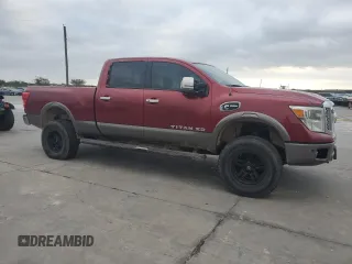 2016 Nissan Titan XD PRO-4X with VIN 1N6BA1F45GN500008, listed as a Copart auction lot 77282724 with 119,868 mi miles and Clean Title. Bid and sale history available at carsss.com. Image 4.