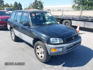 1999 Toyota RAV4 with VIN JT3GP10V6X7061242, listed as a IAAI auction lot 42639695 with 338,937 mi miles and . Bid and sale history available at DreamBid. Image 6.