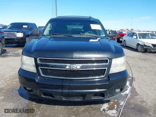 2010 Chevrolet Suburban LT with VIN 1GNUKJE35AR147956, listed as a IAAI auction lot 41722353 with 277,153 mi miles. Bid and sale history available at carsss.com. Image 12.