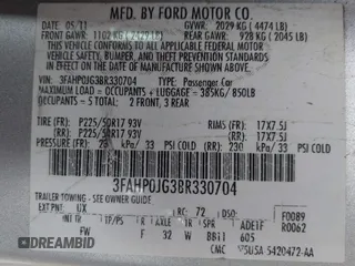 2011 Ford Fusion SEL with VIN 3FAHP0JG3BR330704, listed as a IAAI auction lot 42116994 with 215,020 mi miles. Bid and sale history available at carsss.com. Image 9.