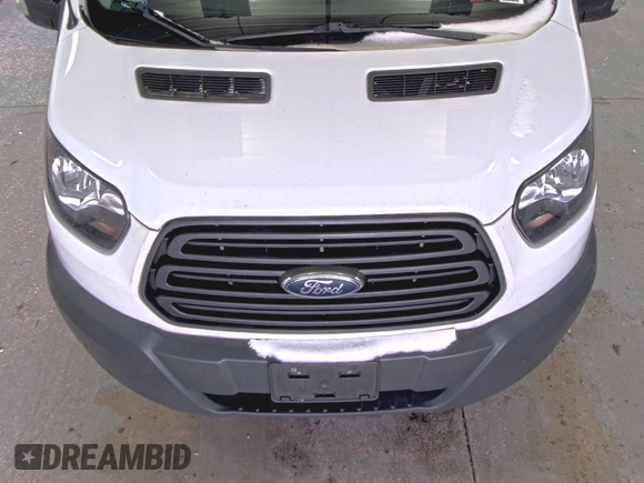 2018 Ford Transit z VIN 1FTYR1YG6JKA87506, wystawiony jako IAAI lot #42501070 z przebiegiem 167 892 mil mil oraz . Historia ofert i sprzedaży dostępna na DreamBid. Obrazek 29.