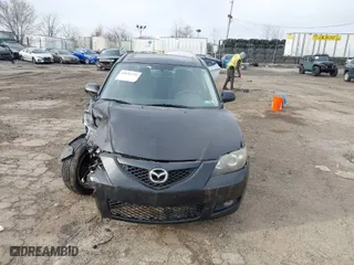 2009 Mazda Mazda3 i Touring Value with VIN JM1BK32G891195769, listed as a IAAI auction lot 41836232 with 151,544 mi miles. Bid and sale history available at carsss.com. Image 13.