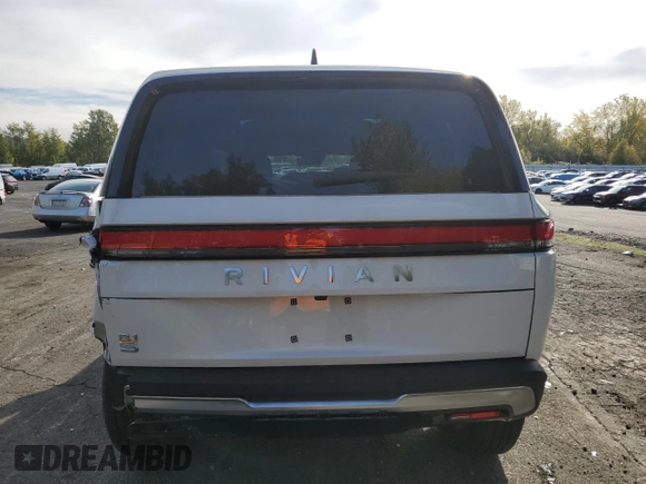 2024 Rivian R1S Adventure z VIN 7PDSGABAXRN035766, wystawiony jako Copart lot #77481034 z przebiegiem 6 590 mil mil oraz Szkoda całkowita • Salvage title. Historia ofert i sprzedaży dostępna na DreamBid. Obrazek 6.