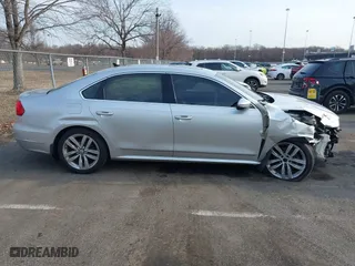 2016 Volkswagen Passat 1.8T SEL with VIN 1VWCT7A3XGC018484, listed as a IAAI auction lot 41763388 with 123,484 mi miles. Bid and sale history available at carsss.com. Image 13.