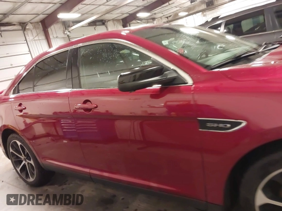2014 Ford Taurus SHO with VIN 1FAHP2KT9EG130834, listed as a IAAI auction lot 41748199 with 98,857 mi miles and . Bid and sale history available at carsss.com. Image 14.