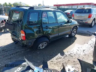 2001 Suzuki Vitara JX z VIN 2S3TD52V416109787, wystawiony jako IAAI lot #42126699 z przebiegiem Nie podano mil oraz . Historia ofert i sprzedaży dostępna na DreamBid. Obrazek 4.