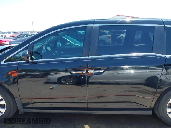 2016 Honda Odyssey EX-L with VIN 5FNRL5H61GB089853, listed as a IAAI auction lot 42019081 with 81,317 mi miles and . Bid and sale history available at DreamBid. Image 15.
