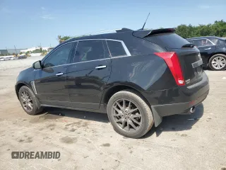2014 Cadillac SRX Premium Collection with VIN 3GYFNDE35ES591071, listed as a Copart auction lot 57891265 with 134,560 mi miles and Salvage title. Bid and sale history available at DreamBid. Image 2.