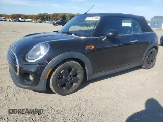 2019 MINI Convertible Cooper with VIN WMWWG5C58K3D01580, listed as a Copart auction lot 77592204 with 106,356 mi miles and Salvage Title. Bid and sale history available at DreamBid. Image 1.