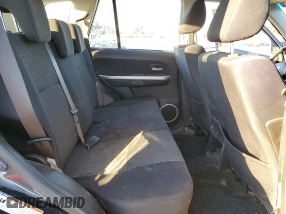 2007 Suzuki Grand Vitara with VIN JS3TE941474202110, listed as a Copart auction lot 77774424 with 131,717 mi miles and Salvage title. Bid and sale history available at DreamBid. Image 11.
