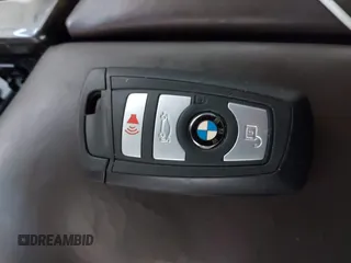 2014 BMW 5 Series 535i xDrive with VIN WBA5B3C58ED531825, listed as a IAAI auction lot 41715275 with 67,782 mi miles and . Bid and sale history available at carsss.com. Image 11.