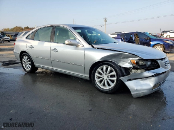 2007 Hyundai Azera SE with VIN KMHFC46F47A242858, listed as a Copart auction lot 78099974 with 136,388 mi miles and Salvage Title. Bid and sale history available at carsss.com. Image 4.