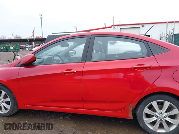 2012 Hyundai Accent GLS with VIN KMHCU4AEXCU168661, listed as a IAAI auction lot 41963258 with 216,006 mi miles. Bid and sale history available at carsss.com. Image 14.