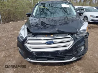 2019 Ford Escape Titanium with VIN 1FMCU9J91KUC42161, listed as a IAAI auction lot 41942122 with 100,677 mi miles and . Bid and sale history available at DreamBid. Image 6.