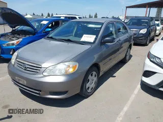 2004 Toyota Corolla CE with VIN 1NXBR32E24Z271001, listed as a IAAI auction lot 42184857 with 156,798 mi miles and . Bid and sale history available at DreamBid. Image 2.