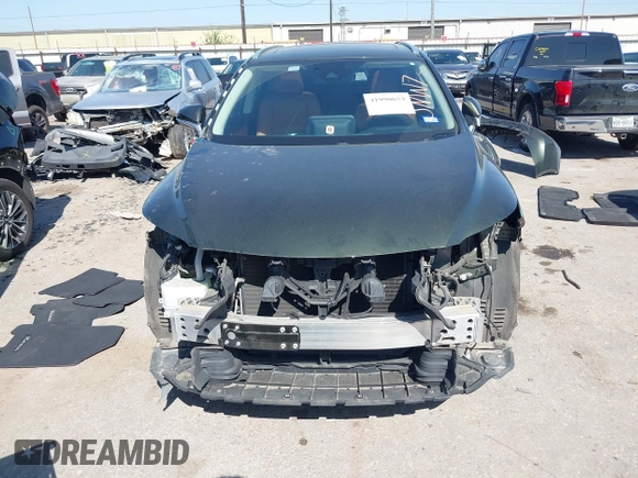 2021 Lexus RX 350 with VIN 2T2HZMAA2MC199129, listed as a IAAI auction lot 41990653 with 60,574 mi miles and . Bid and sale history available at DreamBid. Image 13.