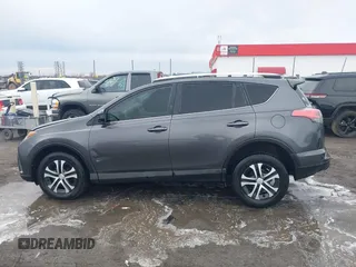 2016 Toyota RAV4 LE with VIN JTMZFREV5GJ093472, listed as a IAAI auction lot 41332037 with 212,869 mi miles. Bid and sale history available at carsss.com. Image 14.