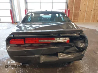 2013 Dodge Challenger SXT z VIN 2C3CDYAG9DH629189, wystawiony jako IAAI lot #41374015 z przebiegiem Nie podano mil oraz . Historia ofert i sprzedaży dostępna na DreamBid. Obrazek 16.