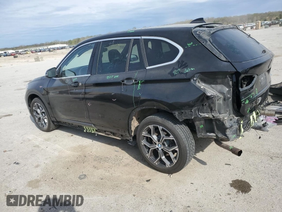 2020 BMW X1 xDrive28i with VIN WBXJG9C06L5P89796, listed as a Copart auction lot 52817235 with 95,665 mi miles and Salvage title. Bid and sale history available at DreamBid. Image 2.