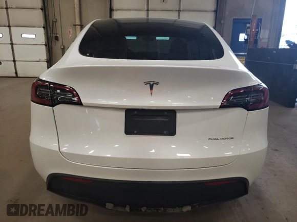 2023 Tesla Model Y Long Range z VIN 7SAYGDEE5PA067389, wystawiony jako Copart lot #54109625 z przebiegiem 24 849 mil mil oraz Szkody całkowita. Historia ofert i sprzedaży dostępna na DreamBid. Obrazek 6.