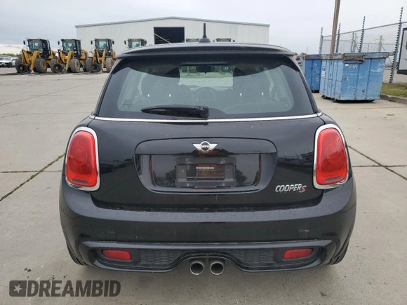 2014 MINI Hardtop S with VIN WMWXM7C57ET987069, listed as a Copart auction lot 52147955 with 121,276 mi miles and Salvage Title. Bid and sale history available at DreamBid. Image 6.