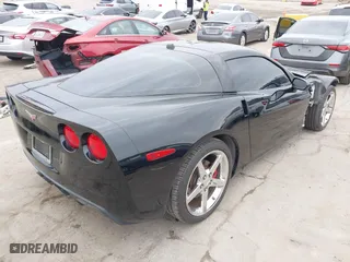 2005 Chevrolet Corvette with VIN 1G1YY24U155119523, listed as a IAAI auction lot 41870761 with 103,986 mi miles. Bid and sale history available at carsss.com. Image 4.