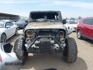 2016 Jeep Wrangler Unlimited Sahara z VIN 1C4HJWEG4GL261147, wystawiony jako IAAI lot #42239252 z przebiegiem 69 604 mil mil oraz . Historia ofert i sprzedaży dostępna na DreamBid. Obrazek 12.