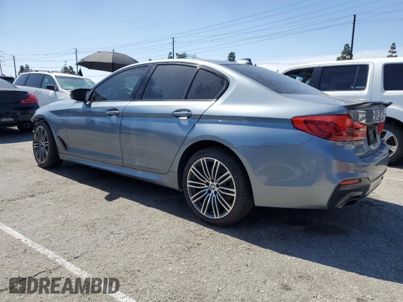 2020 BMW 5 Series 530e with VIN WBAJA9C06LCE66990, listed as a Copart auction lot 48823925 with 57,673 mi miles and Salvage Title. Bid and sale history available at DreamBid. Image 2.