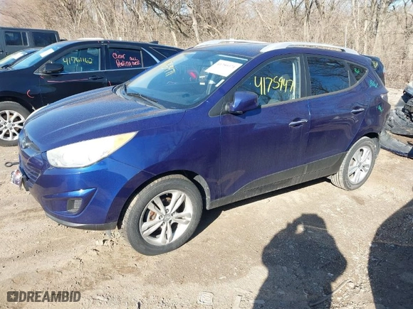 2010 Hyundai Tucson GLS with VIN KM8JU3AC8AU042327, listed as a IAAI auction lot 41759471 with 155,239 mi miles. Bid and sale history available at carsss.com. Image 2.