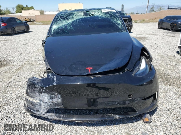 2022 Tesla Model Y Performance z VIN 7SAYGDEF0NF540933, wystawiony jako Copart lot #56087145 z przebiegiem 59 717 mil mil oraz Szkoda całkowita • Salvage title. Historia ofert i sprzedaży dostępna na DreamBid. Obrazek 5.