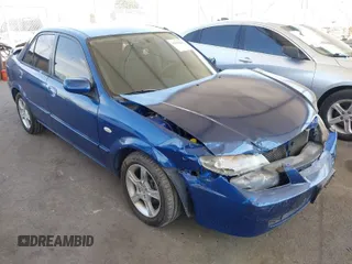 2003 Mazda Protege LX z VIN JM1BJ226X30189831, wystawiony jako IAAI lot #41970226 z przebiegiem 77 976 mil mil oraz . Historia ofert i sprzedaży dostępna na DreamBid. Obrazek 1.