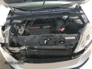 2009 Honda CR-V EX-L z VIN 5J6RE48789L059918, wystawiony jako Copart lot #51609925 z przebiegiem 238 411 mil mil oraz Szkoda całkowita • Salvage title. Historia ofert i sprzedaży dostępna na DreamBid. Obrazek 12.