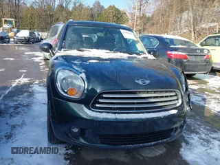 2013 MINI Countryman with VIN WMWZB3C53DWM08700, listed as a IAAI auction lot 41402093 with 71,109 mi miles and . Bid and sale history available at DreamBid. Image 13.