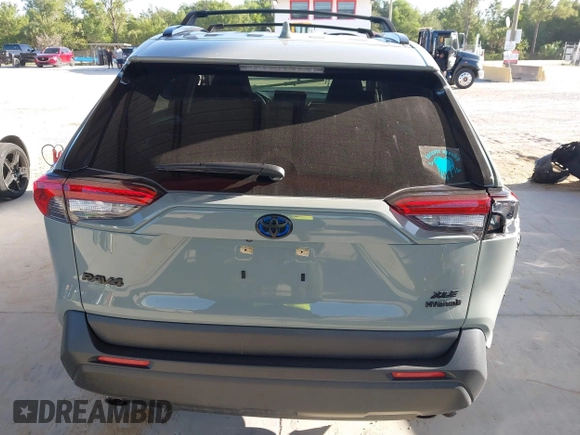 2022 Toyota RAV4 Hybrid XLE with VIN JTMRWRFV9NJ054668, listed as a IAAI auction lot 42606261 with 61,794 mi miles and . Bid and sale history available at DreamBid. Image 16.