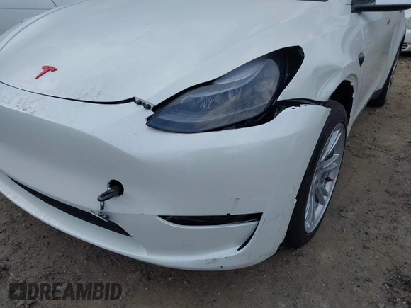 2023 Tesla Model Y Long Range with VIN 7SAYGDEE2PF765395, listed as a IAAI auction lot 41688080 with 27,792 mi miles and . Bid and sale history available at DreamBid. Image 19.