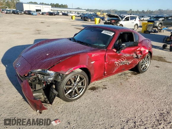 2023 Mazda MX-5 Miata Grand Touring with VIN JM1NDAM71P0559428, listed as a Copart auction lot 76596984 with 7,237 mi miles and Salvage title. Bid and sale history available at DreamBid. Image 1.