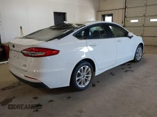 2020 Ford Fusion Hybrid SE with VIN 3FA6P0LU7LR173500, listed as a IAAI auction lot 41368311 with 105,202 mi miles. Bid and sale history available at carsss.com. Image 4.