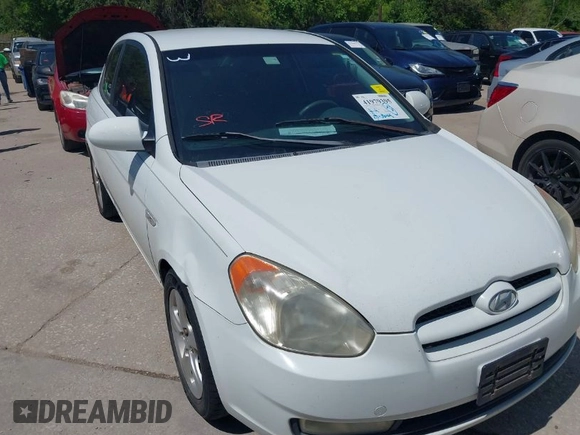 2007 Hyundai Accent SE with VIN KMHCN36C47U009459, listed as a IAAI auction lot 41979395 with 202,844 mi miles. Bid and sale history available at carsss.com. Image 1.