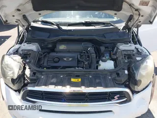 2015 MINI Countryman S with VIN WMWZC3C58FWT05613, listed as a IAAI auction lot 42374870 with 124,214 mi miles and . Bid and sale history available at DreamBid. Image 10.