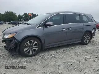 2016 Honda Odyssey Touring Elite с VIN 5FNRL5H99GB059459, выставлен на аукционе Copart как лот 57984285 с пробегом 126 925 миль миль и Списание • Salvage title. История ставок и продаж доступна на DreamBid. Изображение 1.