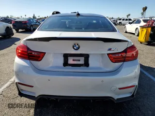 2015 BMW M4 with VIN WBS3R9C55FK330561, listed as a Copart auction lot 40490133 with 65,127 mi miles. Bid and sale history available at carsss.com. Image 6.